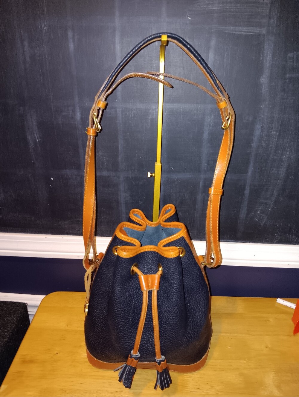 Dooney & Bourke Vintage Navy and Tan Leather Drawstring Bucket Bag